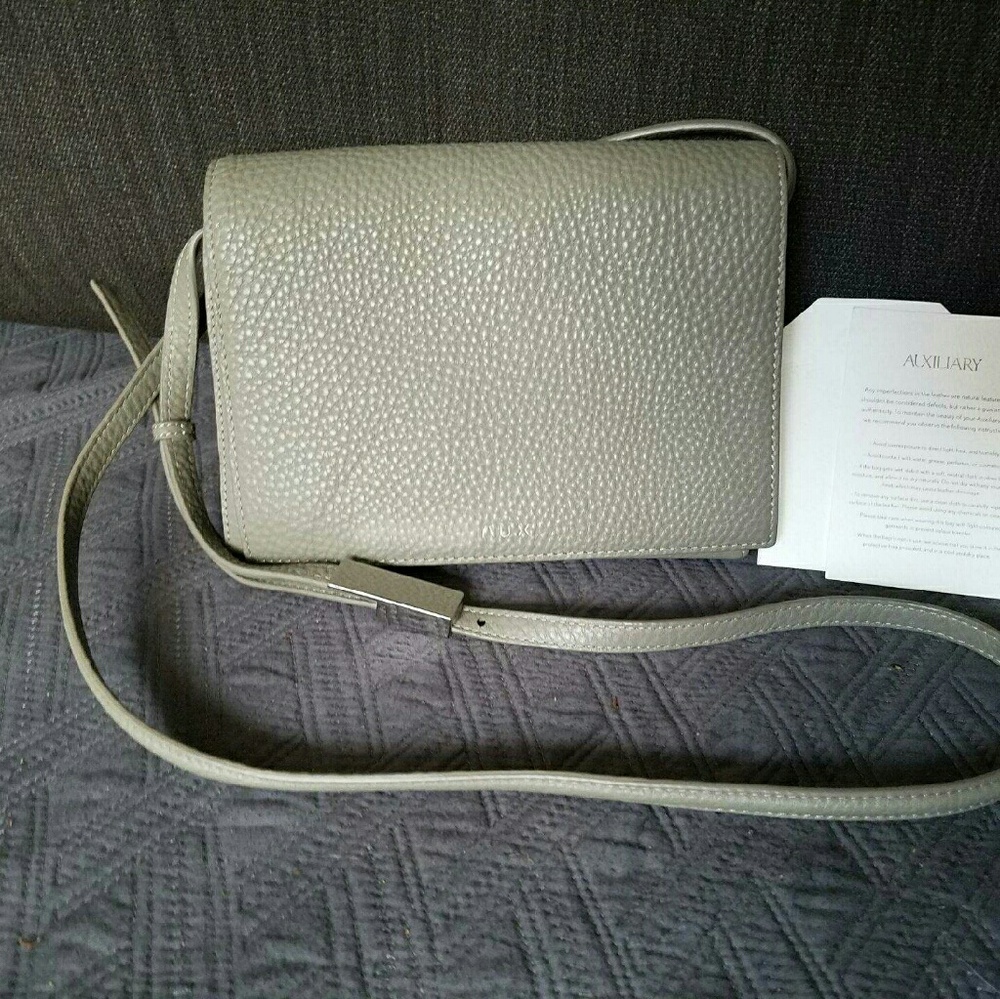 Auxiliary gray pebbled cow leather purse sale!
